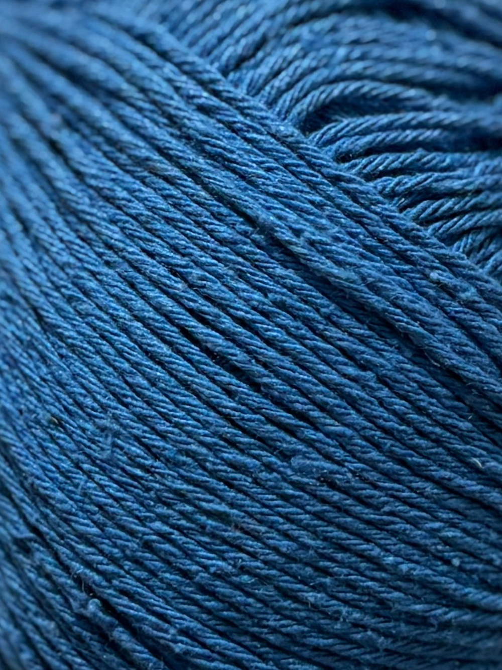 Blue yarn ball of 100% natural silk fiber for the crochet collection of the wildest fig, summer 2026