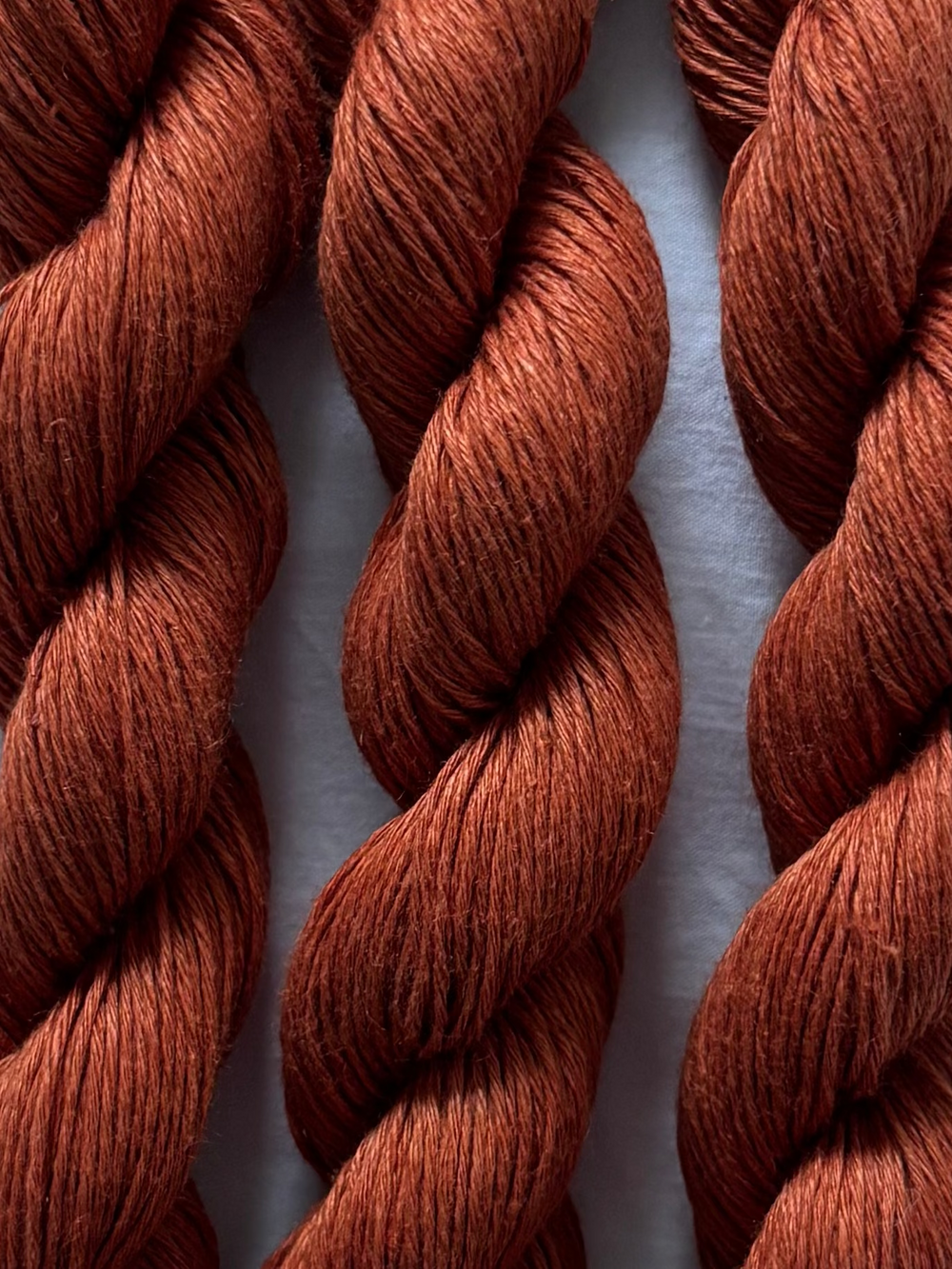rust-colored yarn 100% natural linen fabric for the crochet collection of the wildest fig, summer 2026